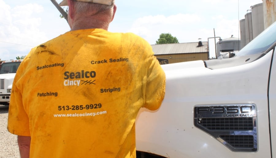 a Sealco Cincy staff member wearing a company shirt